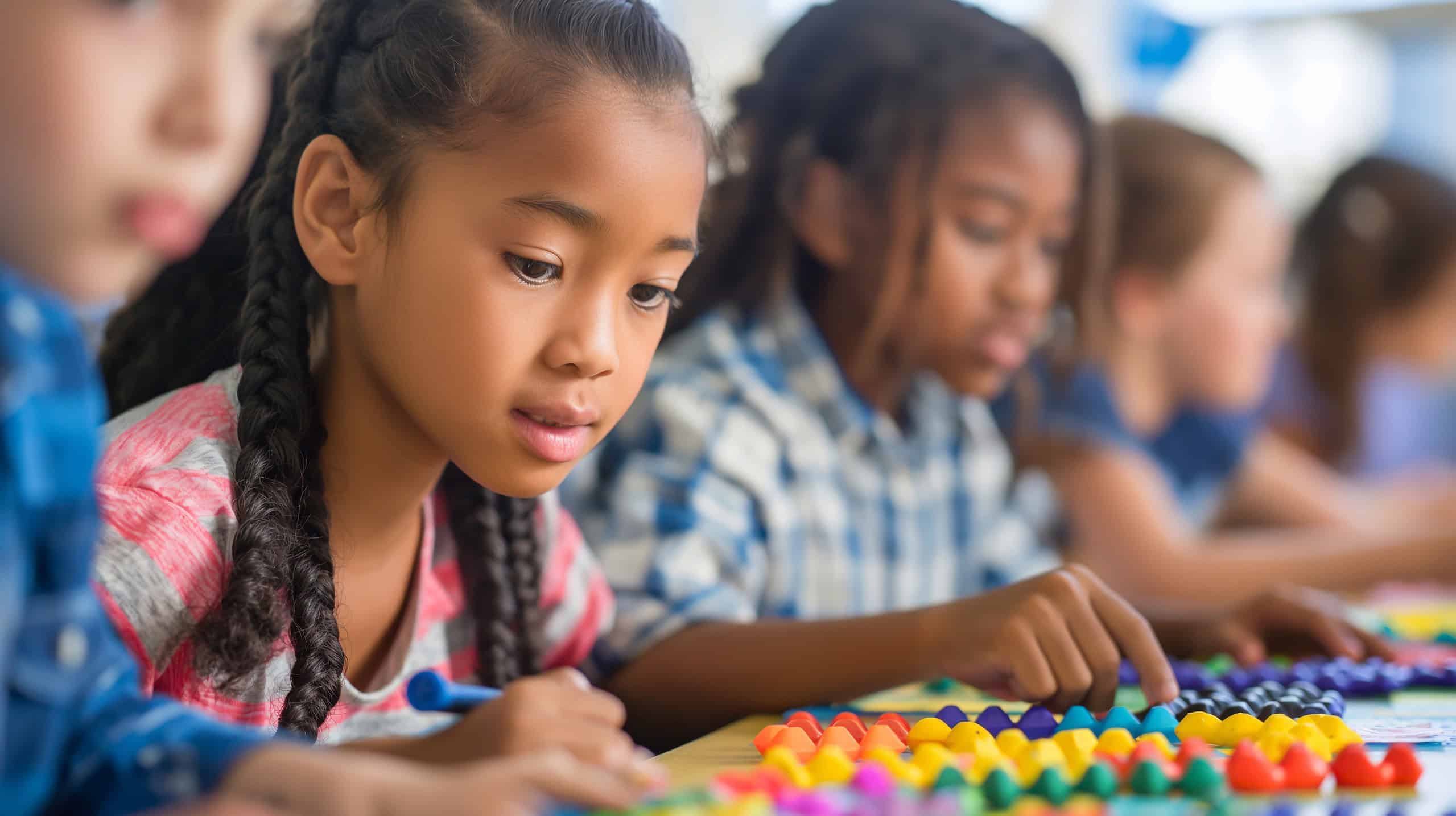 Student learning math in the Montessori Before and After School Program
